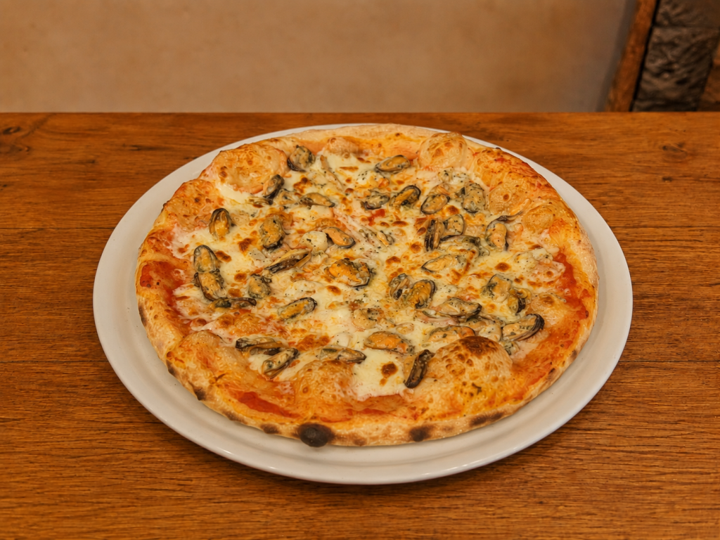 Pizza aux fruits de mer préparée par Pizza Esposito